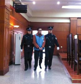 趙勇被帶上法庭。